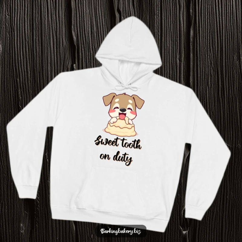Funny Dog Hoodie: A dog happily tasting cake batter with a wagging tail, embodying sweet joy. Great gift.