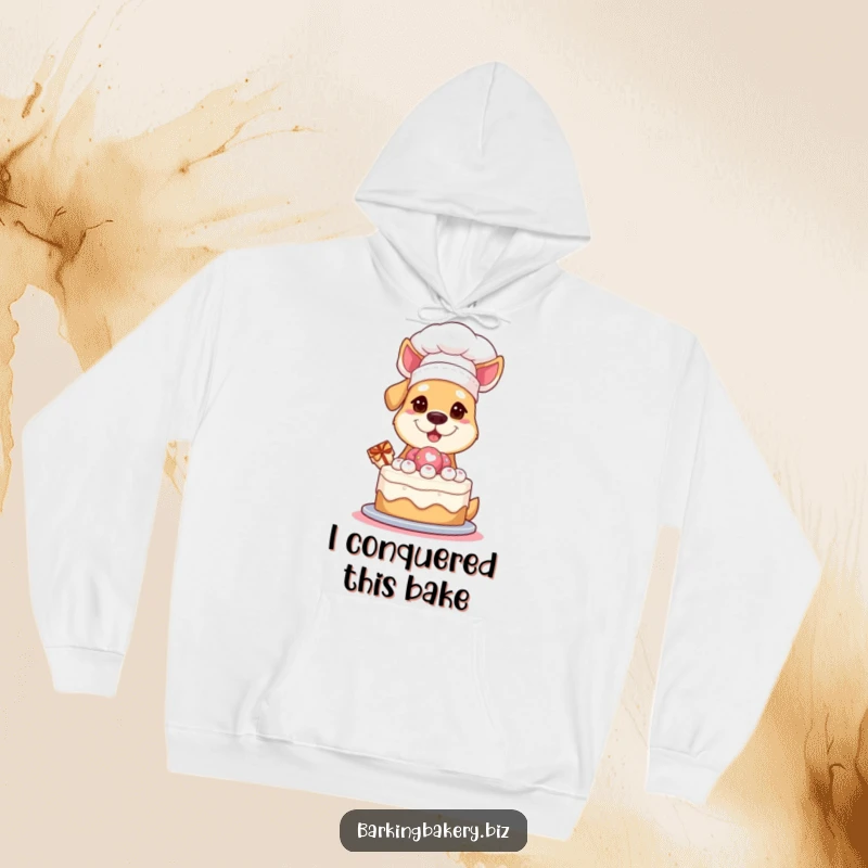 Funny Hoodie: A dog wearing a chef hat proudly presents a cake, offering warmth and humorous celebration for bakers.