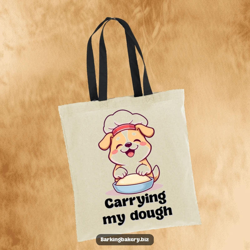 Funny tote bag featuring a dog in a chef hat enthusiastically kneading dough with its paws, a culinary artist.